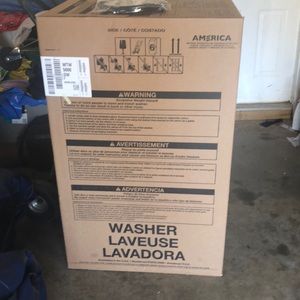 A Brand New Washer Machine In the box still
